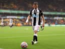 Matt Ritchie of Newcastle United prepares to take a corner kick during the Premier League match between Wolverhampton Wanderers and Newcastle United at Molineux on October 02, 2021 in Wolverhampton, England. (Photo by Naomi Baker/Getty Images)