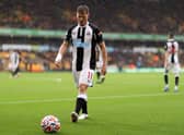 Matt Ritchie of Newcastle United prepares to take a corner kick during the Premier League match between Wolverhampton Wanderers and Newcastle United at Molineux on October 02, 2021 in Wolverhampton, England. (Photo by Naomi Baker/Getty Images)