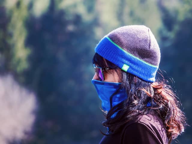 Some health chiefs have suggested wearing masks outdoors, particularly in crowded streets, to help prevent the spread of infection.
