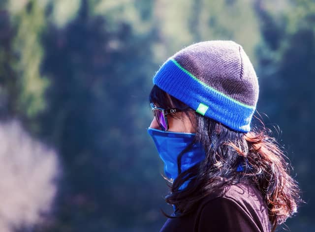 Some health chiefs have suggested wearing masks outdoors, particularly in crowded streets, to help prevent the spread of infection.