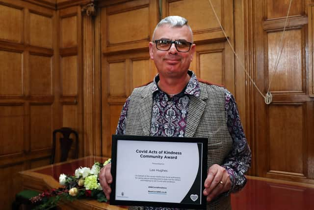 Lee Hughes with his Covid Act of Kindness Community Award.