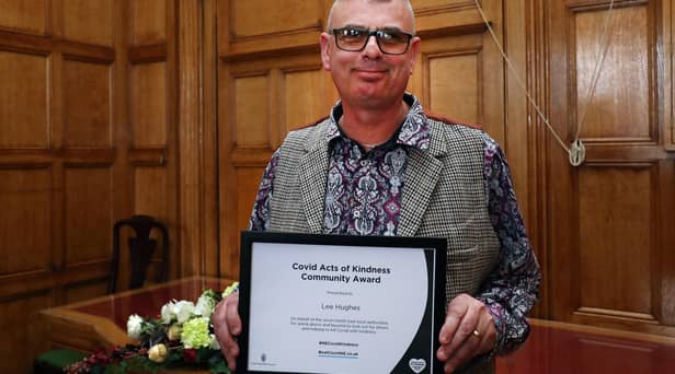 Lee Hughes with his Covid Act of Kindness Community Award.