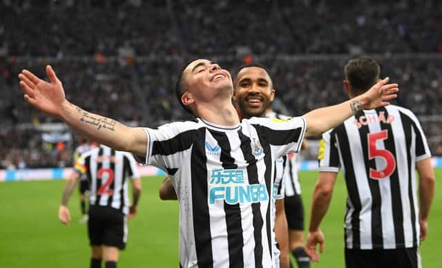 Goalscorer Miguel Almiron celebrates after scoring the fourth Newcastle goal with Callum Wilson during the Premier League match between Newcastle United and Aston Villa at St. James Park on October 29, 2022 in Newcastle upon Tyne, England. (Photo by Stu Forster/Getty Images)