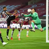 Callum Wilson of Newcastle United scores his team's first goal past Lukasz Fabianski of West Ham United  (Photo by Michael Regan/Getty Images)