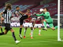 Callum Wilson of Newcastle United scores his team's first goal past Lukasz Fabianski of West Ham United  (Photo by Michael Regan/Getty Images)