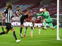Callum Wilson of Newcastle United scores his team's first goal past Lukasz Fabianski of West Ham United  (Photo by Michael Regan/Getty Images)