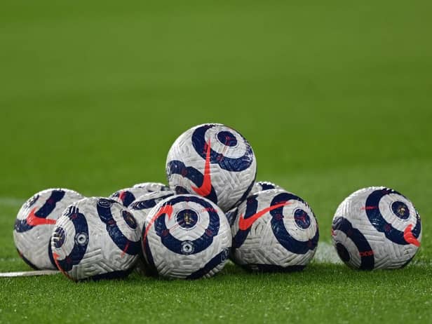 Premier League match balls. (Photo by Shaun Botterill/Getty Images)