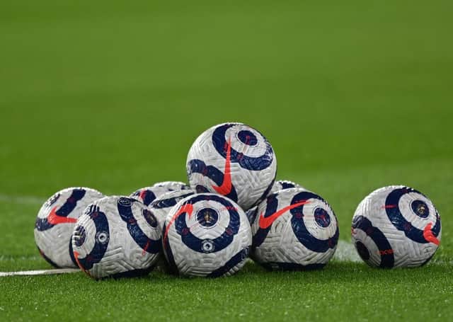 Premier League match balls. (Photo by Shaun Botterill/Getty Images)