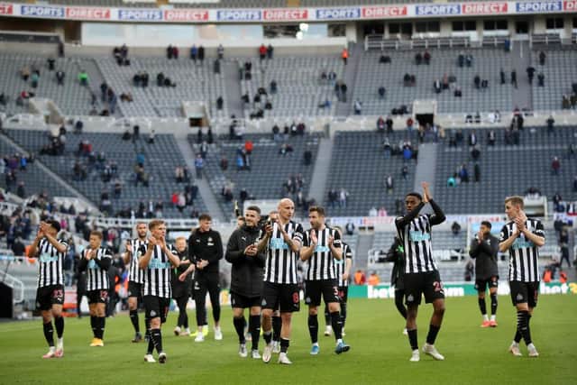 Players of Newcastle United applaud fans after the Premier League match between Newcastle United and Sheffield United at St. James Park on May 19, 2021 in Newcastle upon Tyne, England. A limited number of fans will be allowed into Premier League stadiums as Coronavirus restrictions begin to ease in the UK. (Photo by Carl Recine - Pool/Getty Images)