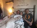 Emma Corkin (centre) with daughter Ebbie (left) partner Tony and son Daniel.