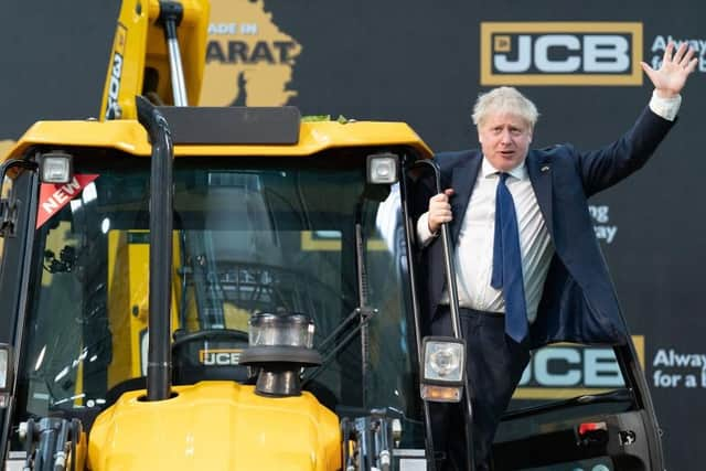 VALODARA, INDIA - APRIL 21: Prime Minister Boris Johnson pictured at the JCB Factory in Vadodara, Gujarat, during his two-day trip to India on April 21. Picture: Stefan Rousseau - WPA Pool/Getty Images.