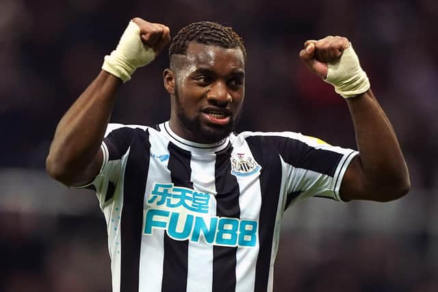 Allan Saint-Maximin celebrates Newcastle United's Carabao Cup win.