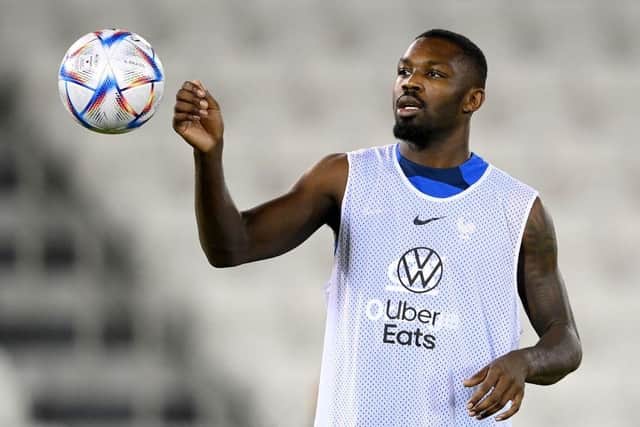 France's forward Marcus Thuram eyes the ball during a training session at the Jassim-bin-Hamad Stadium in Doha on November 20, 2022, ahead of the Qatar 2022 World Cup football tournament. (Photo by FRANCK FIFE / AFP) (Photo by FRANCK FIFE/AFP via Getty Images)
