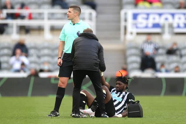 Allan Saint-Maximin receives treatment against Sheffield United.