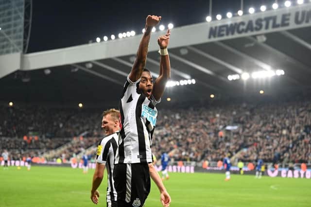 Newcastle player Joe Willock celebrates after scoring the winning goal during the Premier League match between Newcastle United and Chelsea FC at St. James Park on November 12, 2022 in Newcastle upon Tyne, England. (Photo by Stu Forster/Getty Images)