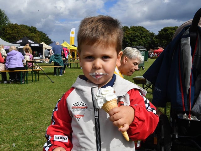 Ollie Frankland enjoys the summer sun with a cold treat.