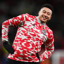 Jesse Lingard of Manchester United reacts as he warms up prior to the Premier League match between Manchester United and Burnley at Old Trafford on December 30, 2021 in Manchester, England. (Photo by Dan Mullan/Getty Images)