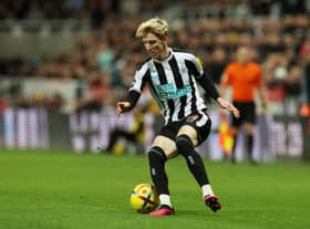 Anthony Gordon of Newcastle United runs with the ball during the Premier League match between Newcastle United and West Ham United at St. James Park on February 04, 2023 in Newcastle upon Tyne, England. (Photo by Ian MacNicol/Getty Images)