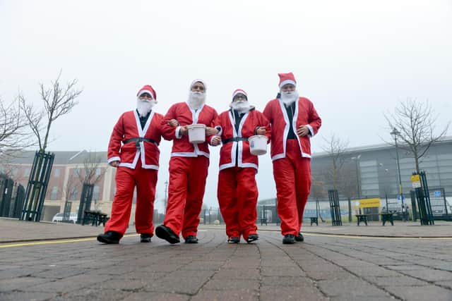 Jak's uncles and cousin on the festive sponsored walk to raise money to provide Christmas presents for disadvantaged children.