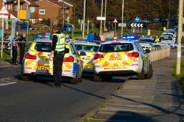 Police at the scene of the crash on Galsworthy Road in Whiteleas. Photo by Sean Martin.