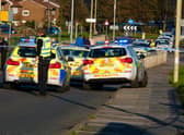 Police at the scene of the crash on Galsworthy Road in Whiteleas. Photo by Sean Martin.