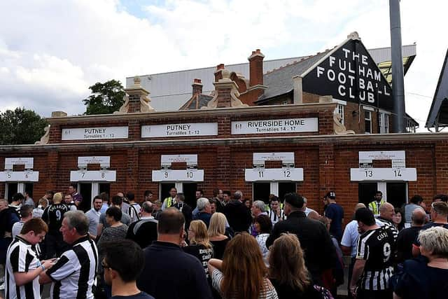 Newcastle United fans gather at Craven Cottage in 2016.