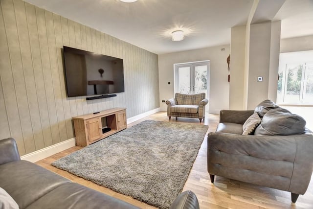 The living area is found in the open plan kitchen.