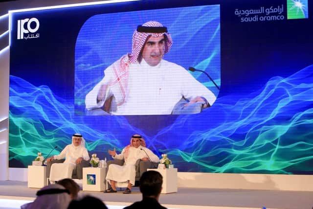 President and CEO of Saudi Aramco Amin Nasser (L) and Aramco's chairman Yasir al-Rumayyan answer questions during a press conference in the eastern Saudi Arabian region of Dhahran on November 3, 2019. - Saudi Aramco confirmed it planned to list on the Riyadh stock exchange, describing it as a "significant milestone" in the history of the energy giant. (Photo by - / AFP) (Photo by -/AFP via Getty Images)