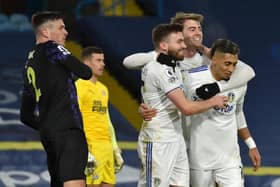 Ciaran Clark reacts as Stuart Dallas celebrates his goal.