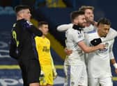 Ciaran Clark reacts as Stuart Dallas celebrates his goal.