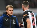 Ciaran Clark of Newcastle United makes his way past Eddie Howe, the Newcastle manager: Stu Forster/Getty Images