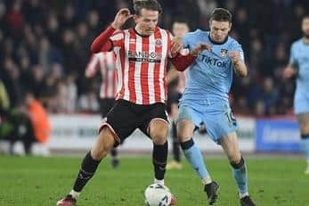 Goalscorers Sheffield United's Sander Berge and Wrexham's Paul Mullin during their fourth round FA Cup replay at Bramall Lane, Sheffield. Picture courtesy of Gary Oakley / Sportimage.