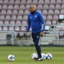 Ipswich Town coach Kieron Dyer during the pre-match warm-up.