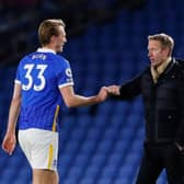 Graham Potter, Manager of Brighton and Hove Albion interacts with Dan Burn. (Photo by Andrew Couldridge - Pool/Getty Images)