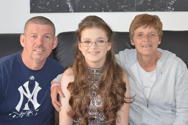 George Thompson with daughter Georgia and wife Lynn.