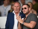 Peterborough director of football Barry Fry speaks to Peterborough chairman Darragh MacAnthony.