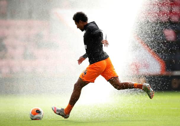 BOURNEMOUTH, ENGLAND - JULY 01: Isaac Hayden of Newcastle United warms up prior to the Premier League match between AFC Bournemouth and Newcastle United at Vitality Stadium on July 01, 2020 in Bournemouth, England.