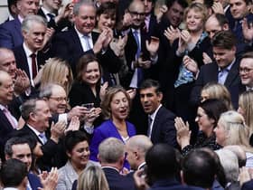 Rishi Sunak is congratulated as he arrives at Conservative party HQ in Westminster, London, after it was announced he will become the new leader of the Conservative party after rival Penny Mordaunt dropped out.