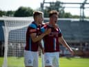 Dillon Morse, right, celebrates his goal with Jack Bodenham. Picture by Craig McNair.
