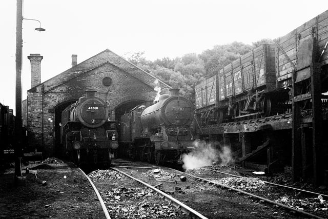 Alnmouth Engine Shed: On 18th September 1955, Ivatt 4MT 2-6-0 no. 43016 from Heaton (52B) and class J39 0-6-0 no. 64941 were on shed. Servicing was done here. Ash from the loco fires was dropped between the rails and then hand-carted away: like coaling, another mucky job! The turntable was at the Alnwick branch junction, outside the shed bounds and necessitated inefficient light engine movements. (G.W.Morrison)