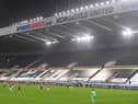 A general view of the action played out in torrential rain during the Premier League match between Newcastle United and Burnley at St. James Park on October 03, 2020 in Newcastle upon Tyne, England. Sporting stadiums around the UK remain under strict restrictions due to the Coronavirus Pandemic as Government social distancing laws prohibit fans inside venues resulting in games being played behind closed doors.
