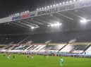 A general view of the action played out in torrential rain during the Premier League match between Newcastle United and Burnley at St. James Park on October 03, 2020 in Newcastle upon Tyne, England. Sporting stadiums around the UK remain under strict restrictions due to the Coronavirus Pandemic as Government social distancing laws prohibit fans inside venues resulting in games being played behind closed doors.