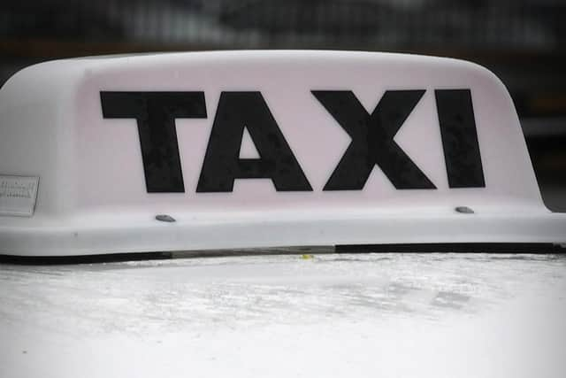 File picture of a taxi sign