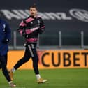 TURIN, ITALY - FEBRUARY 09: Alessandro Di Pardo of Juventus (L) and Radu Dragusin of Juventus (R) during the Coppa Italia semi-final match between Juventus and FC Internazionale at Allianz Stadium on February 9, 2021 in Turin, Italy. Sporting stadiums around Italy remain under strict restrictions due to the Coronavirus Pandemic as Government social distancing laws prohibit fans inside venues resulting in games being played behind closed doors. (Photo by Chris Ricco/Getty Images)