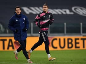 TURIN, ITALY - FEBRUARY 09: Alessandro Di Pardo of Juventus (L) and Radu Dragusin of Juventus (R) during the Coppa Italia semi-final match between Juventus and FC Internazionale at Allianz Stadium on February 9, 2021 in Turin, Italy. Sporting stadiums around Italy remain under strict restrictions due to the Coronavirus Pandemic as Government social distancing laws prohibit fans inside venues resulting in games being played behind closed doors. (Photo by Chris Ricco/Getty Images)