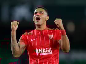 Diego Carlos of Sevilla celebrates following the La Liga Santander match between Real Betis and Sevilla FC at Estadio Benito Villamarin on November 07, 2021 in Seville, Spain. (Photo by Fran Santiago/Getty Images)