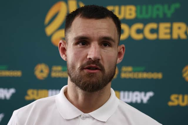 DOHA, QATAR - NOVEMBER 17: Bailey Wright of Australia speaks to the media during the Australia Press Conference at the Aspire Training Ground on November 17, 2022 in Doha, Qatar. (Photo by Robert Cianflone/Getty Images)