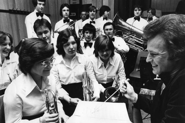 Gary Young, bandmaster of Boldon Colliery Brass Band, gives players a final talk before they take to the stage at Westoe Miners' Club, in the first heat of the Vaux 1978  Brass Band  Competition.