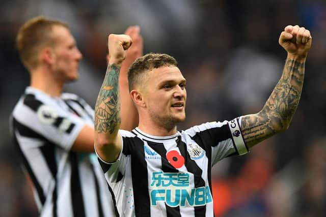 Newcastle United's English defender Kieran Trippier celebrates after the final whistle of the English Premier League football match between Newcastle United and Chelsea at St James' Park in Newcastle-upon-Tyne, north east England on November 12, 2022. (Photo by ANDY BUCHANAN/AFP via Getty Images)