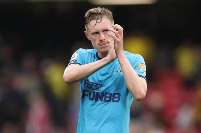 Sean Longstaff applauds fans a the final whistle.